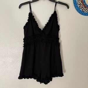New IRIS ruffle romper black in size large